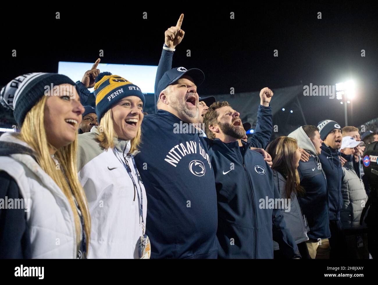 University Park, USA. 26th Nov, 2016. Penn State offensive line coach Matt Limegrover and defensive coordinator Brent Pry sing the alma mater and celebrate with the team after a 45-12 win against Michigan State at Beaver Stadium in University Park, Pennsylvania, on Saturday, Nov. 26, 2016. (Photo by Abby Drey/Centre Daily Times/TNS/Sipa USA) Credit: Sipa USA/Alamy Live News Stock Photo
