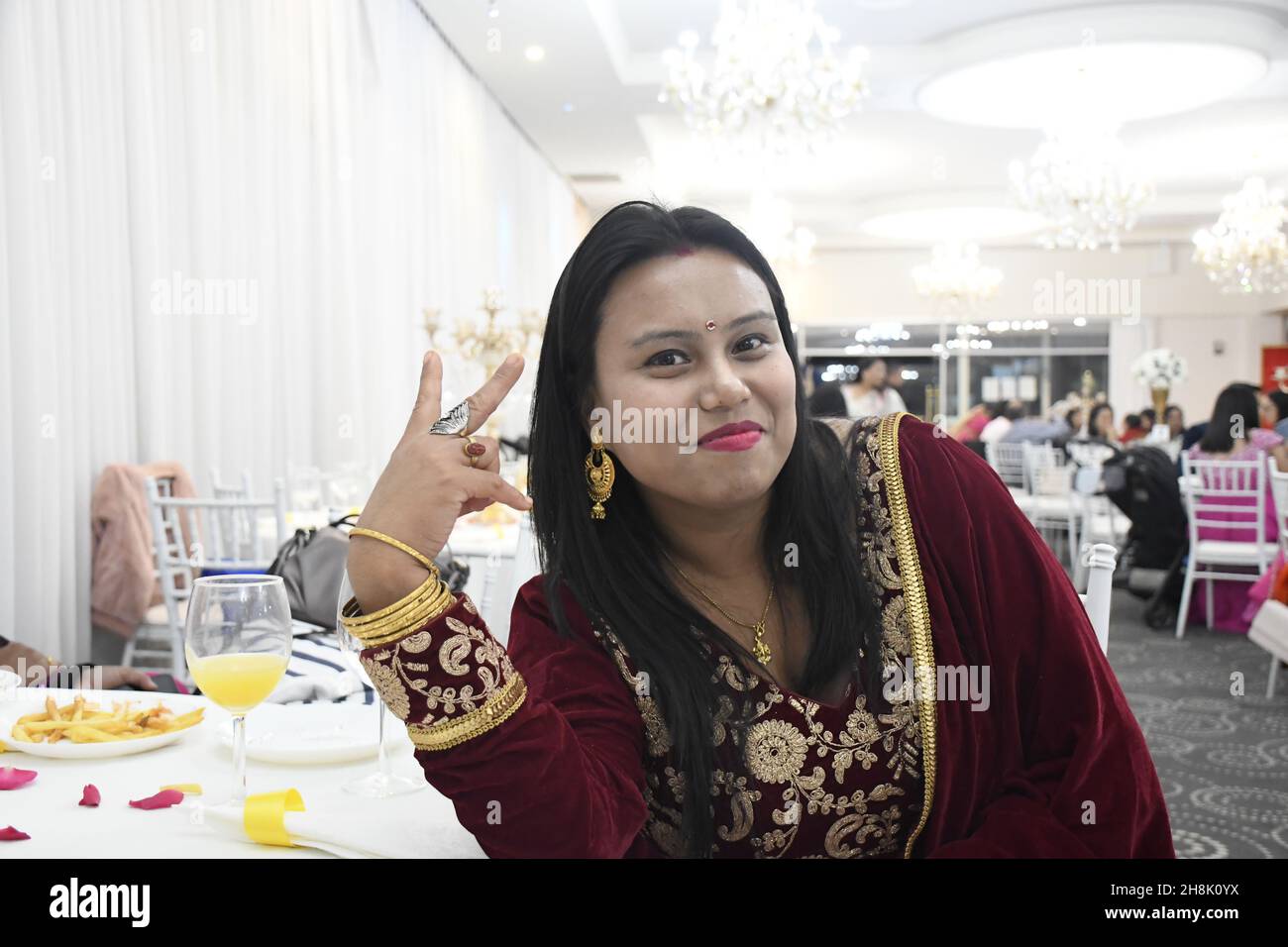 Portrait of a beautiful woman in a traditional costume at an event Stock Photo
