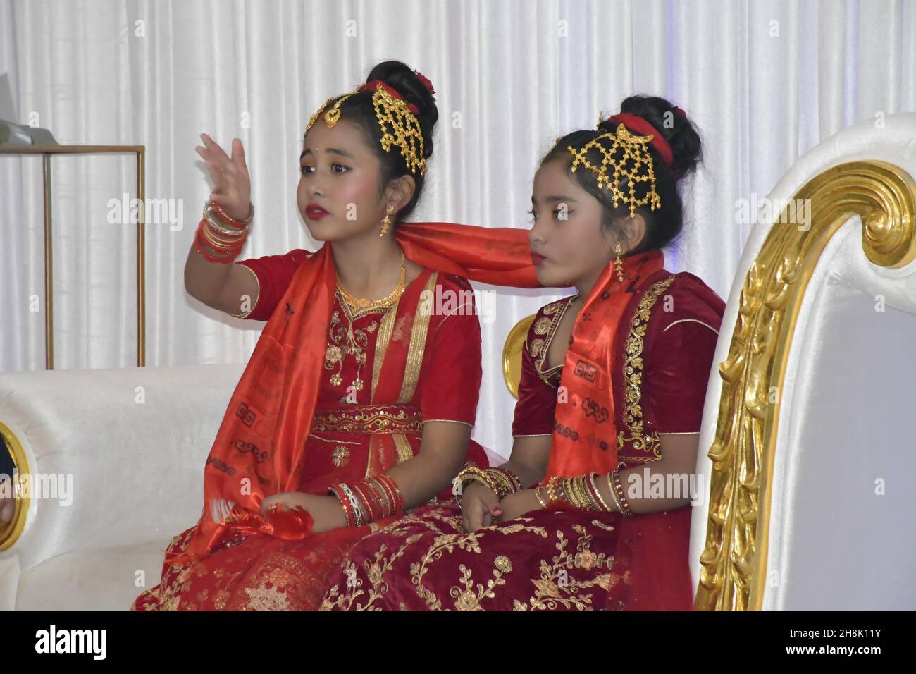 SY, AUSTRALIA - Apr 24, 2021: The two cute girls in traditional Hindu costumes for EEHI function in Sydney, Australia Stock Photo
