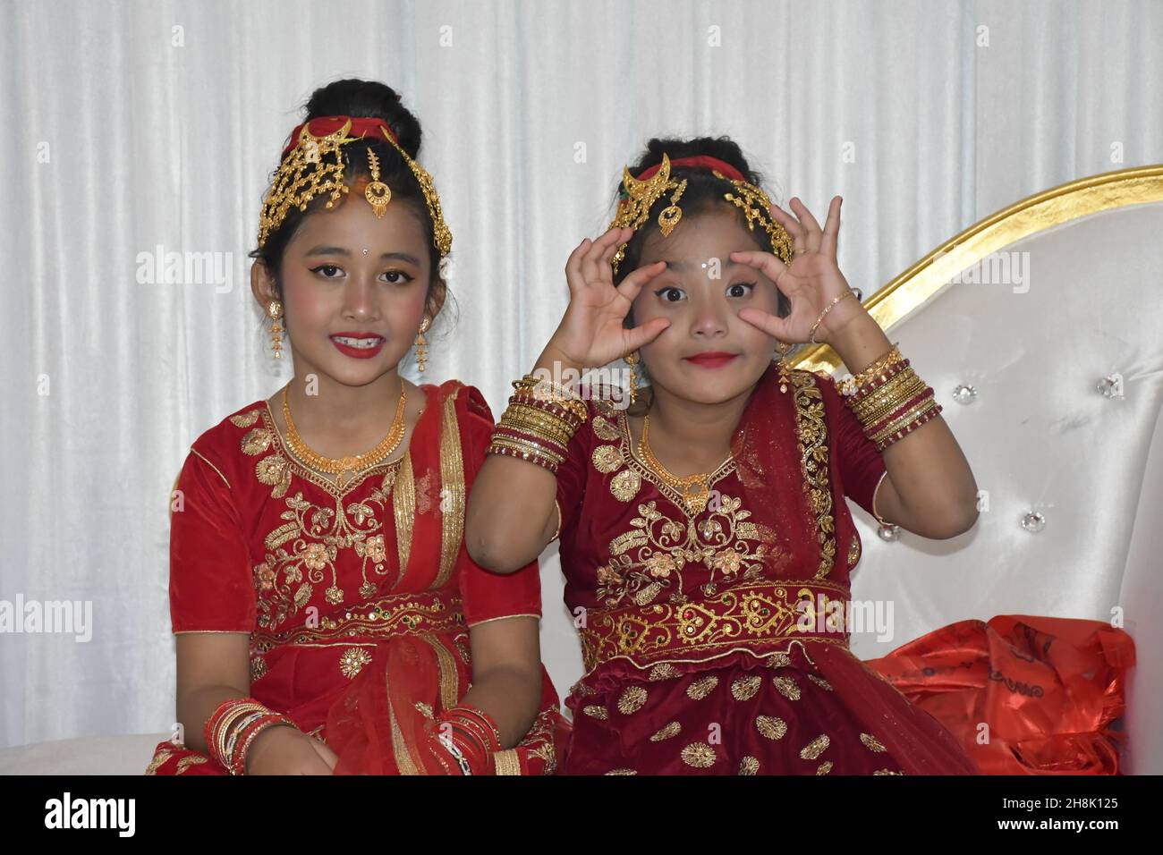 SYDNEY, AUSTRALIA - Apr 24, 2021: The two cheerful girls in traditional Hindu costumes for EEHI function in Sydney, Australia Stock Photo