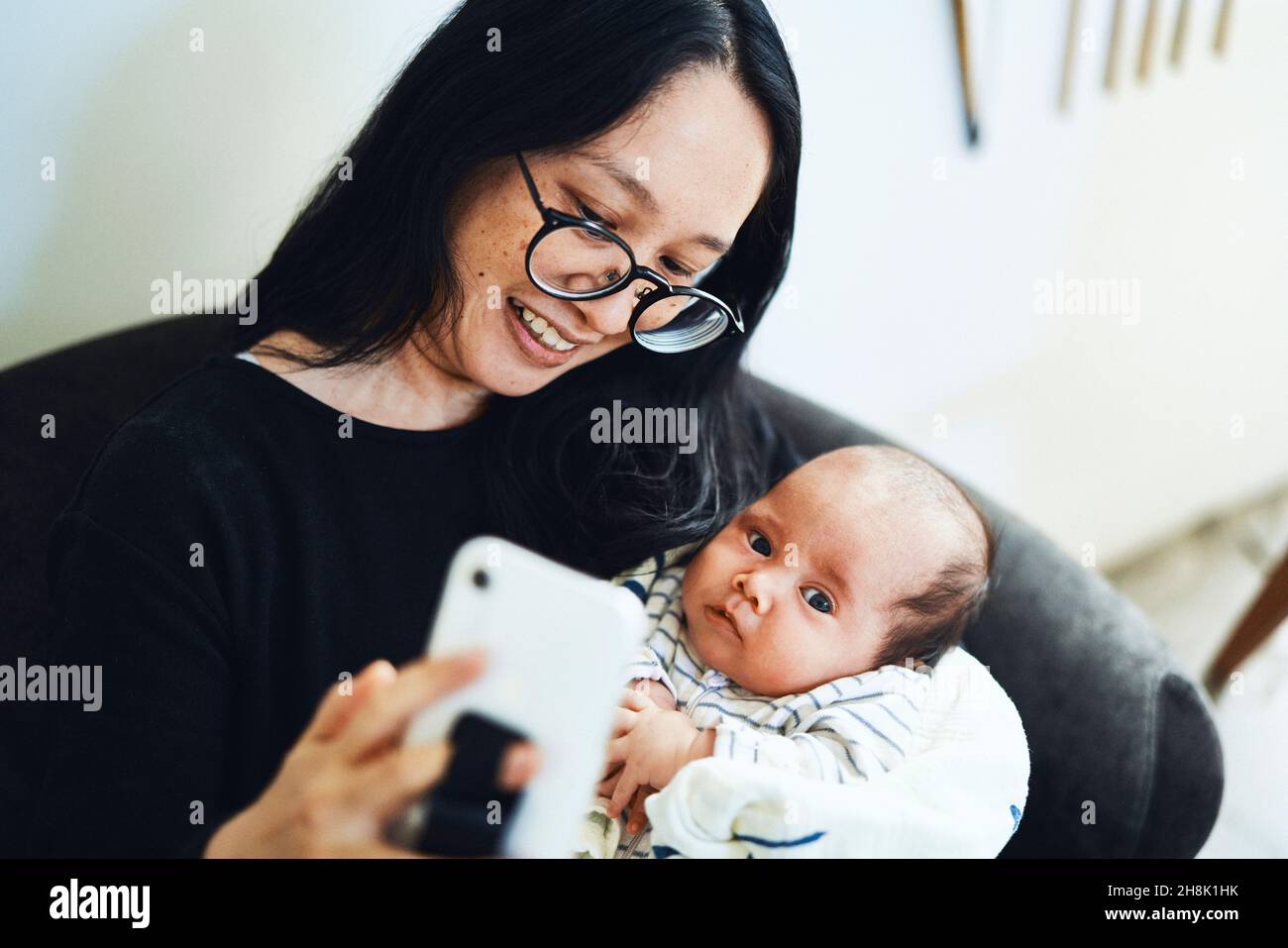 Nurse caring newborn child hi-res stock photography and images - Alamy