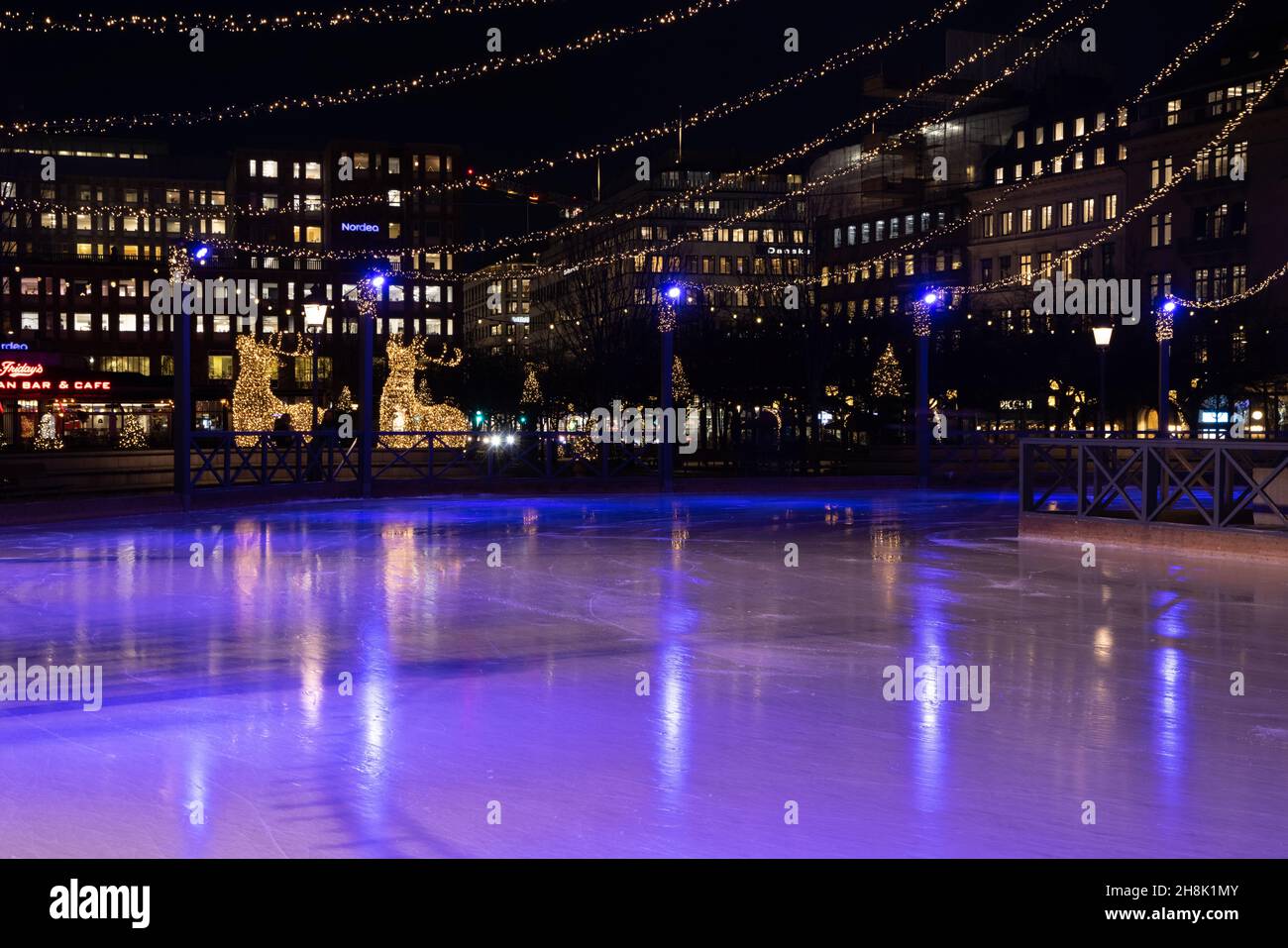 Winter in Stockholm. Ice skating in the square in Kungstradgarden Stock
