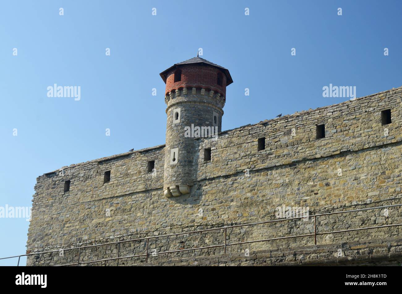 Stone wall and tower of the Kamianets-Podilskyi Castle (XIV century)  in Ukraine. Medieval fortification architecture Stock Photo