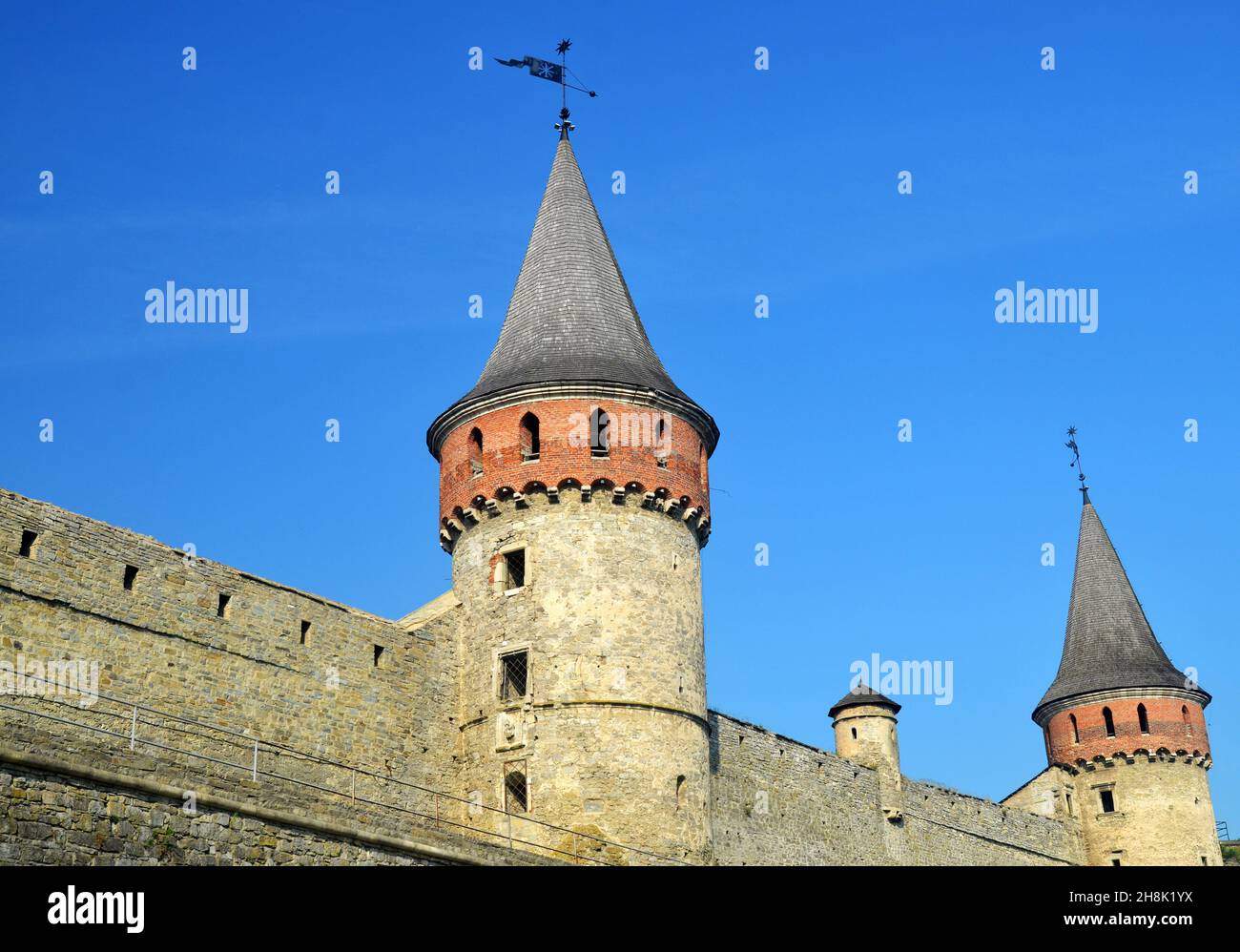 Brick wall and tower of the Kamianets-Podilskyi Fortress (XIV century)  in Ukraine. Medieval fortification Stock Photo