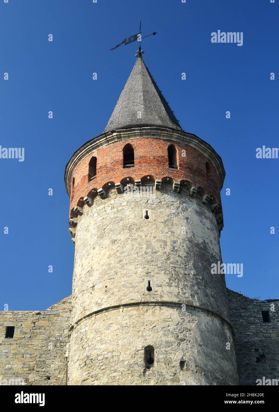 Brick wall and tower of the Kamianets-Podilskyi Fortress (XIV century)  in Ukraine. Medieval fortification Stock Photo