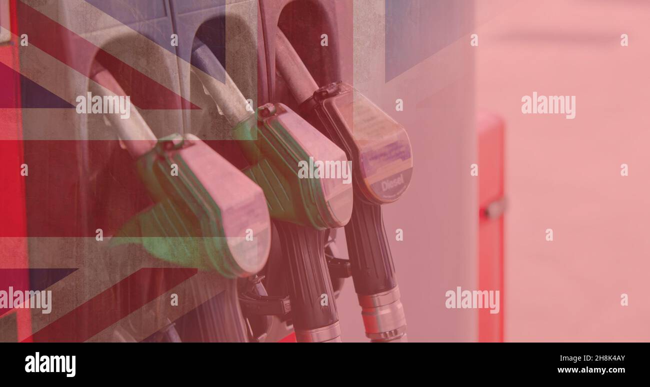 Double exposure of fuel pumps at gas station with union jack flag Stock Photo