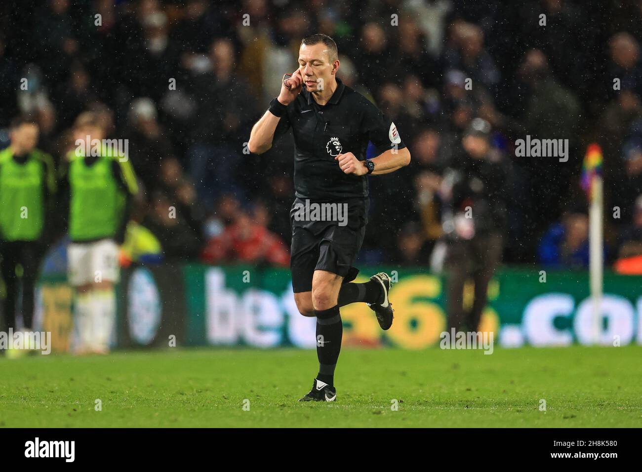 Referee Kevin Friend runs to the VAR Screen to check for penalty Stock Photo