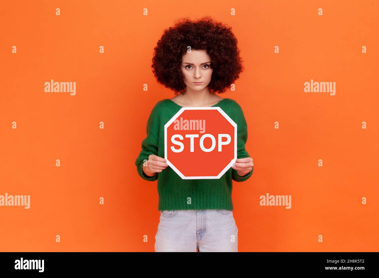 Young woman stop sign hand hi-res stock photography and images - Alamy