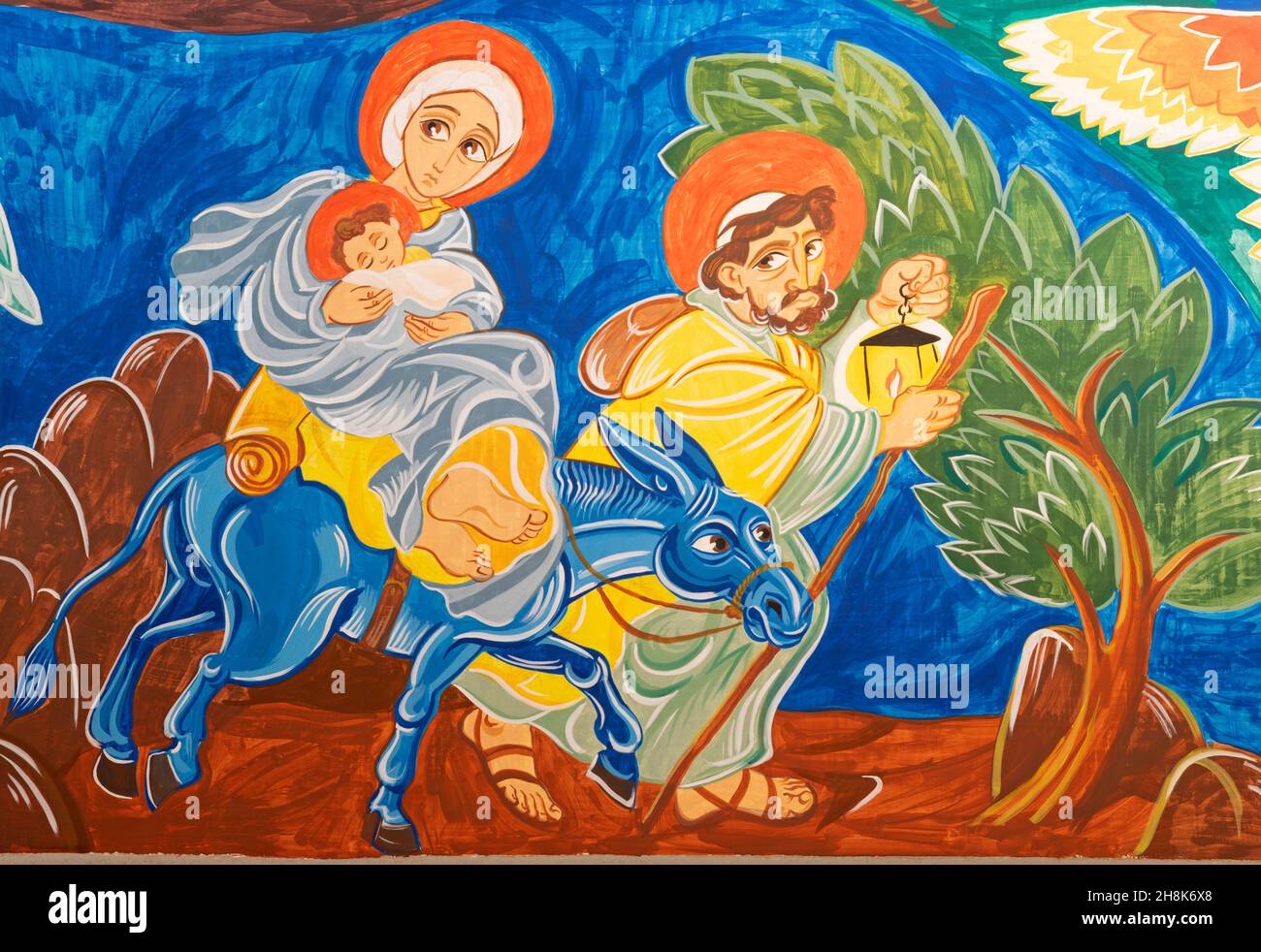 FORLÍ, ITALY - NOVEMBER 11, 2021:  The modern fresco Flight to Egypt in the church Chiesa di San Giuseppe Artigiano by Franco Vignazia (2019). Stock Photo