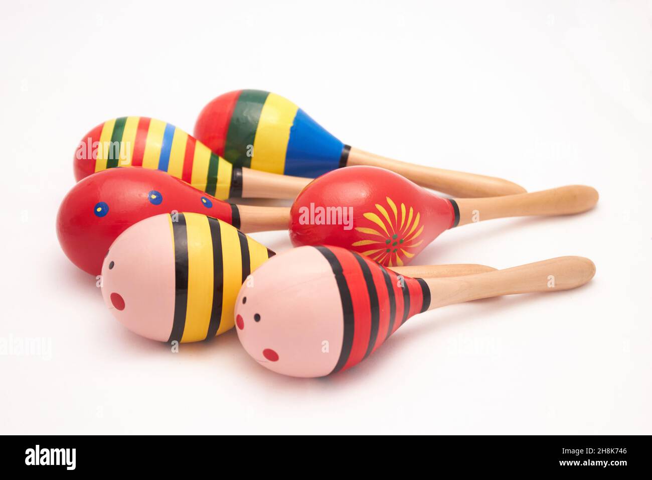 wooden rattle for children. style musical intelligence. Stock Photo