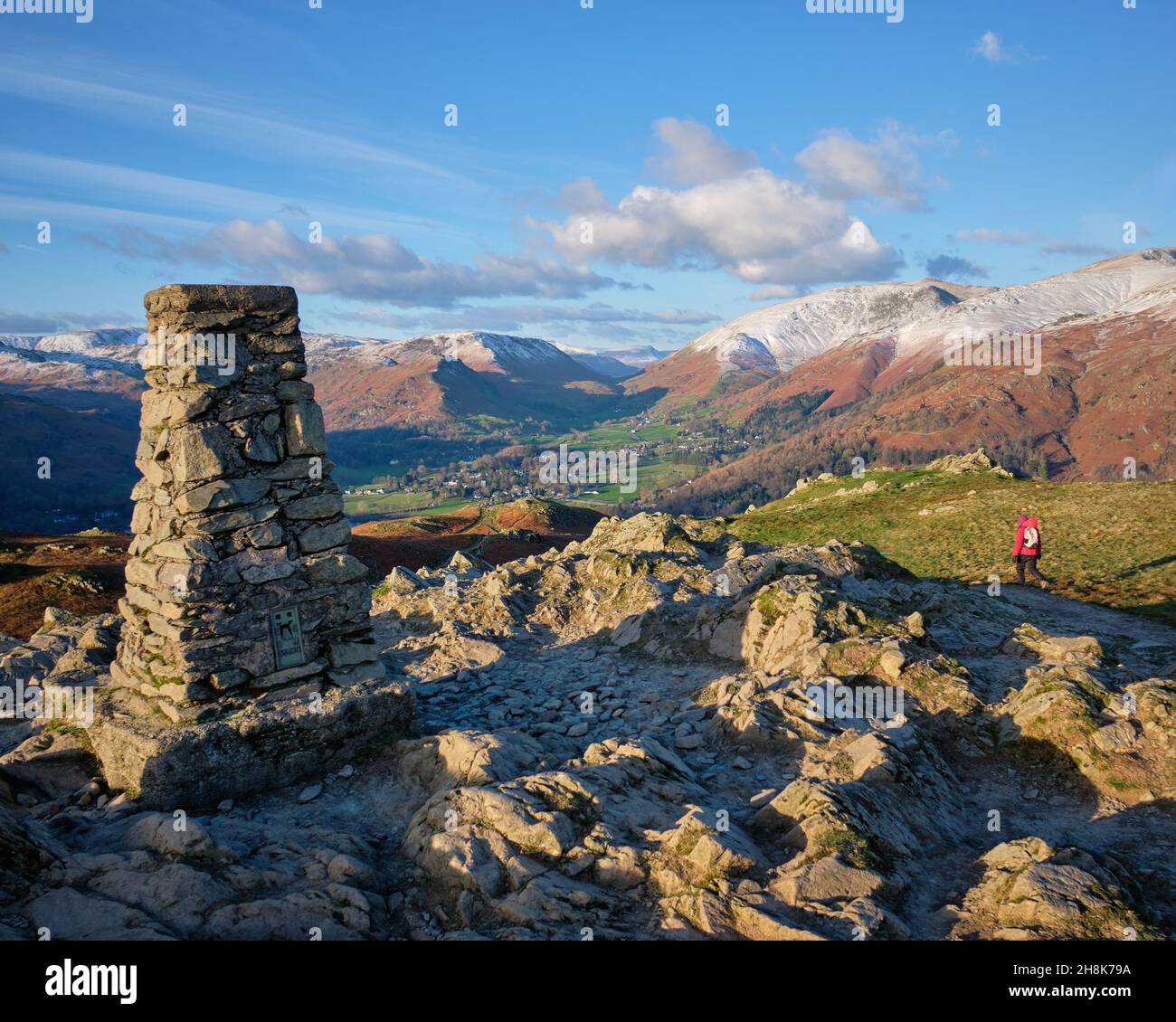 A dusting of snow on the fells above Grasmere from the summit of Loughrigg, Lake District, UK Stock Photo