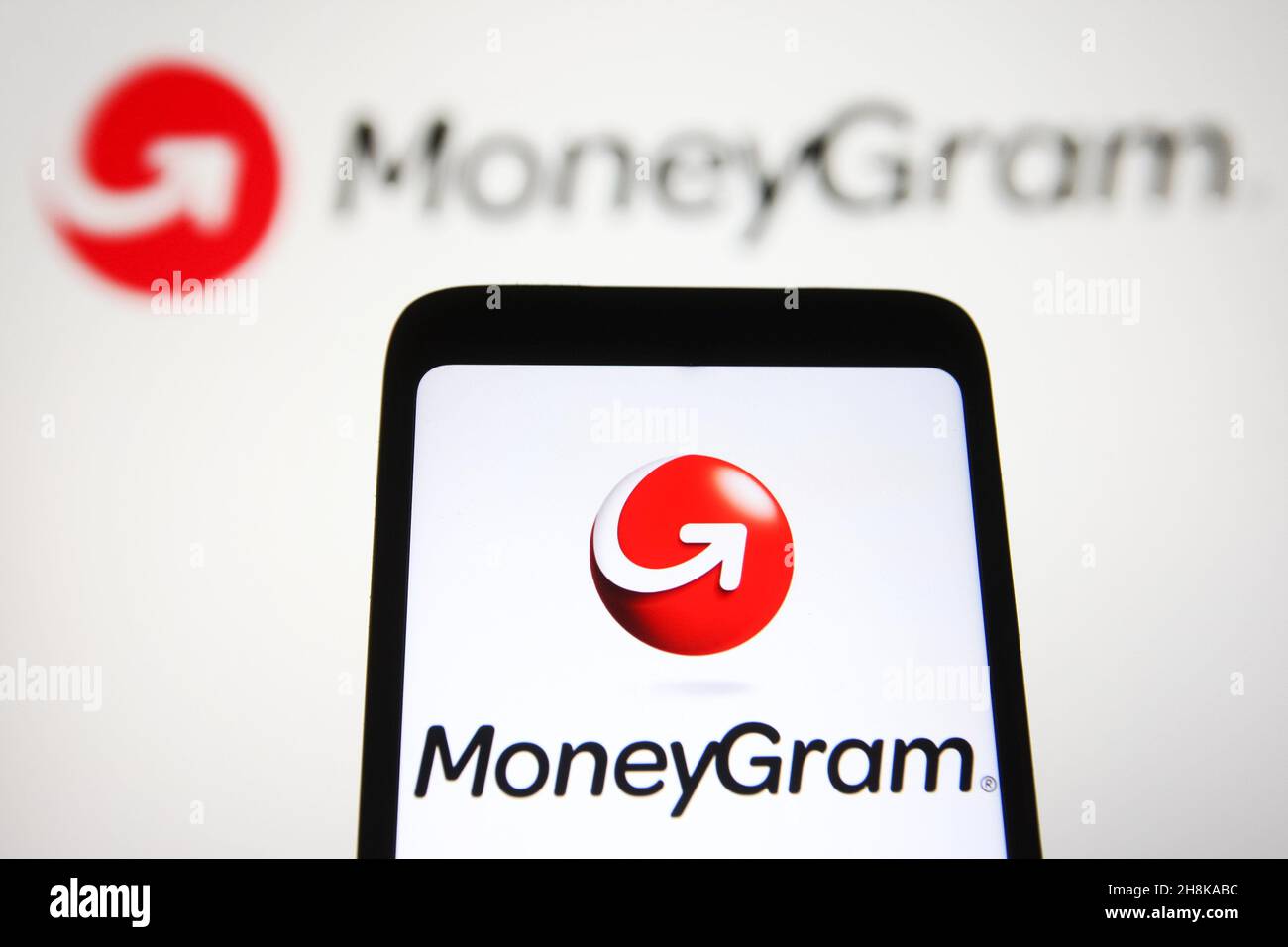 In this photo illustration, MoneyGram International, Inc. logo is seen ...