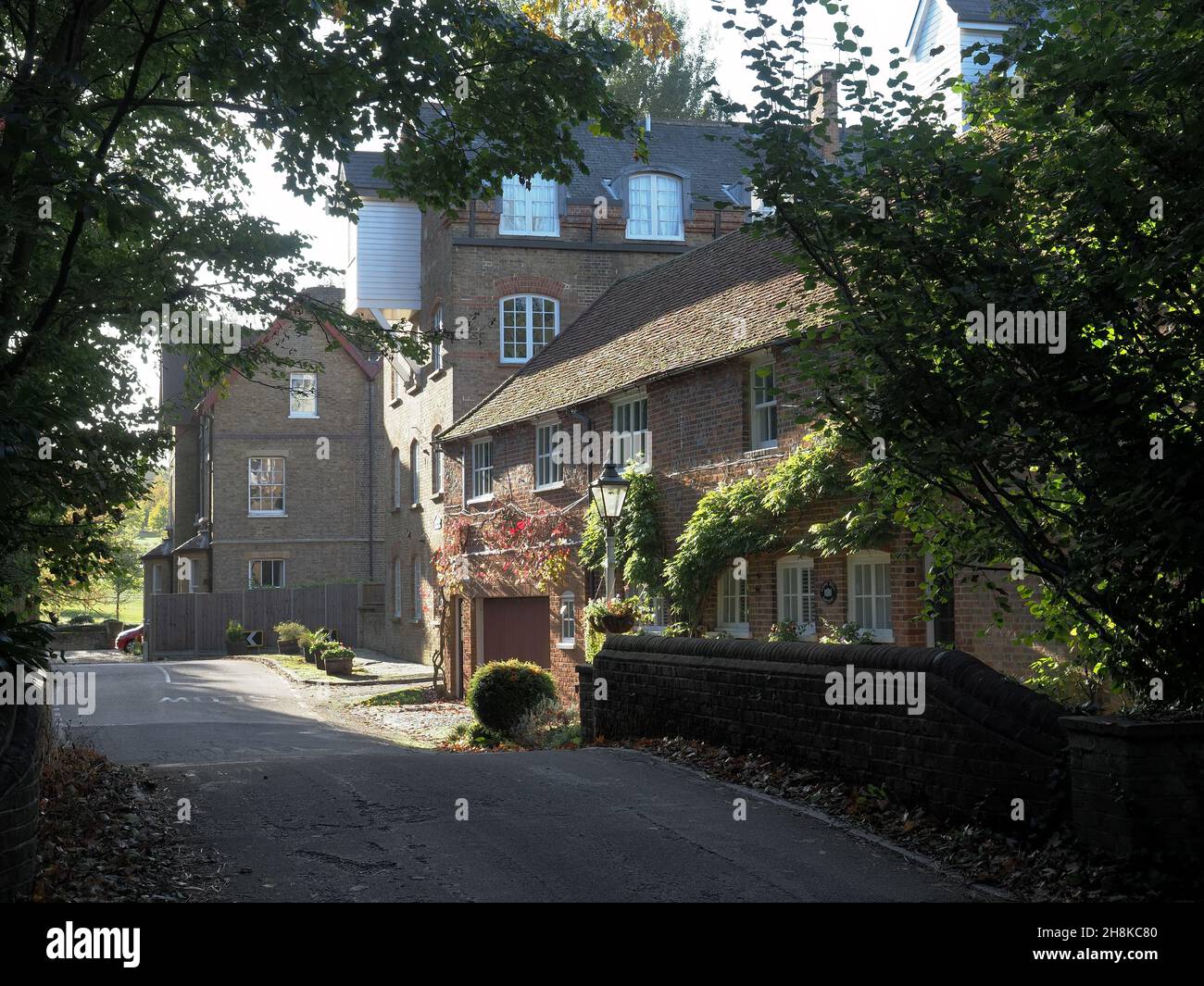 View of cottages and The Grove Mill in Grove Mill Lane Watford Hertfordshire Stock Photo