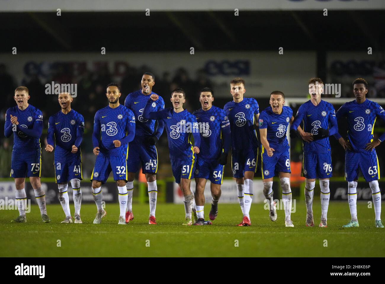 Nailsworth, UK. 30th Nov, 2021. Chelsea players celebrate during the penalty shootout (l-r) Lewis Hall, George McEachran, Lewis Baker, Xavier Mbuyamba, Joe Haigh, Xavier Simons, George Nunn, Alfie Gilchrist, Brodi Hughes & Malik Mothersille of Chelsea U21 during the EFL Papa Johns Trophy match between Forest Green Rovers and Chelsea U21 at The New Lawn, Nailsworth, England on 30 November 2021. Photo by Andy Rowland. Credit: PRiME Media Images/Alamy Live News Stock Photo