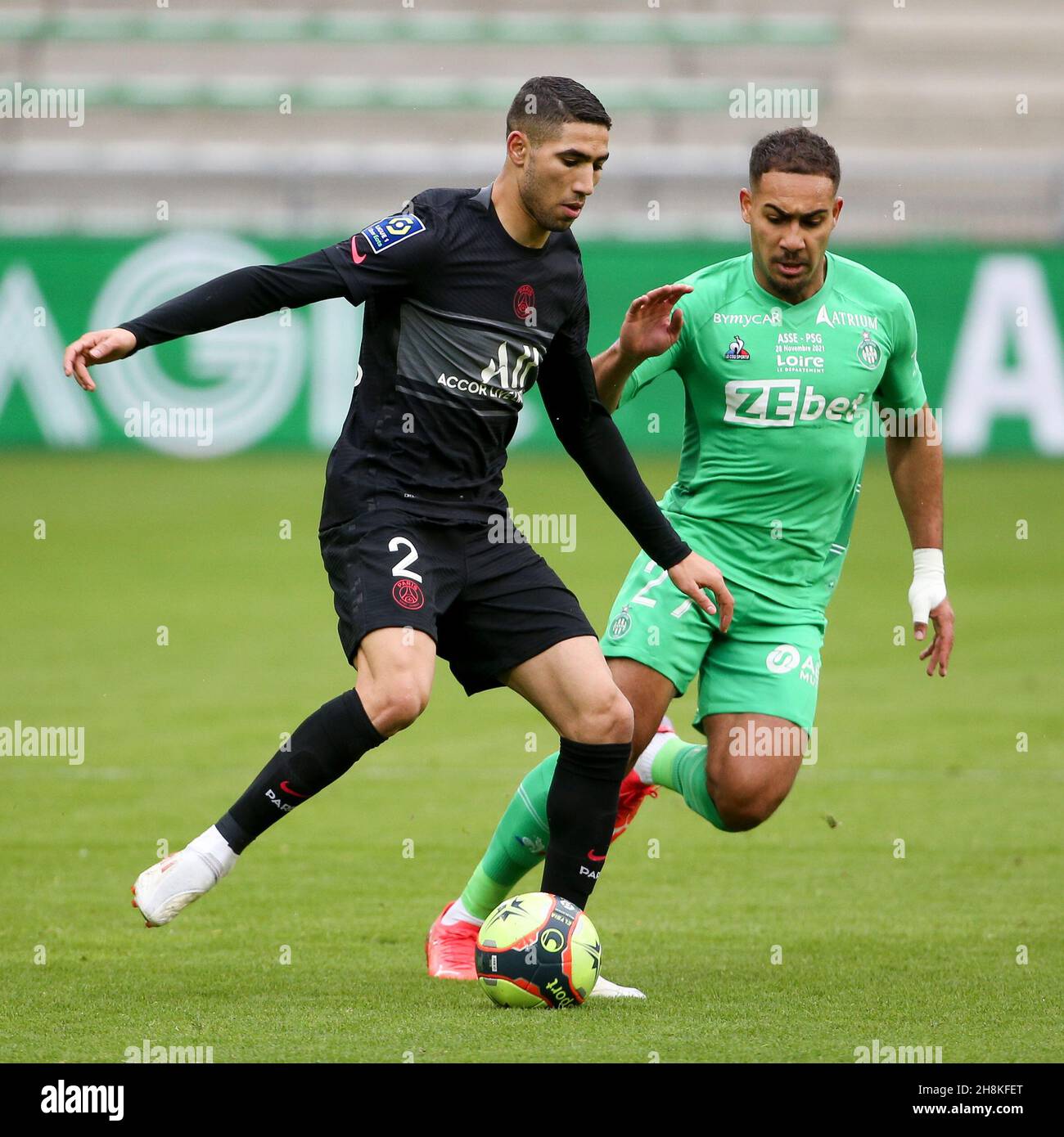 Achraf Hakimi of PSG, Ivann Macon of Saint-Etienne during the French  championship Ligue 1 football match between AS Saint-Etienne (ASSE) and  Paris Saint-Germain (PSG) on November 28, 2021 at Stade Geoffroy Guichard