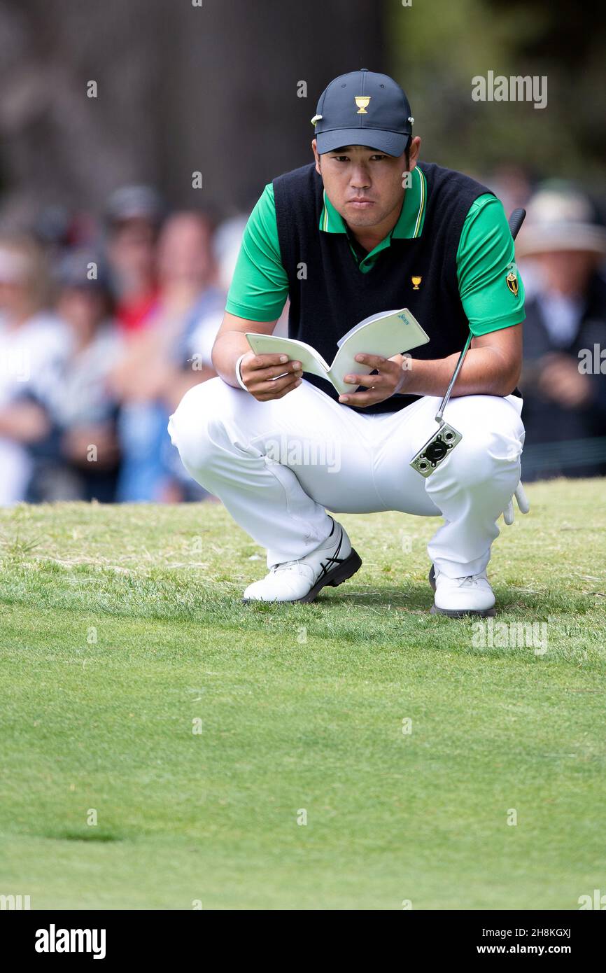 Hideki Matsuyama of Japan looks at the slope of the 11th green during round 2 of The Presidents Cup Credit: Speed Media/Alamy Live News Stock Photo