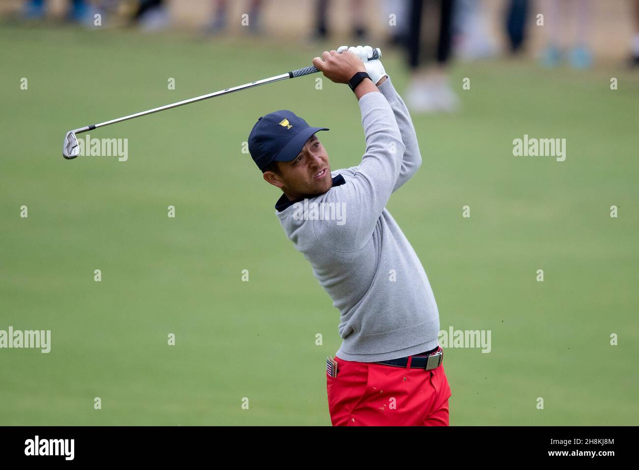 Xander Schauffele of team USA hits his approach shot on the 4th hole during round 3 of The Presidents Cup Credit Speed Media/Alamy Live News Stock Photo