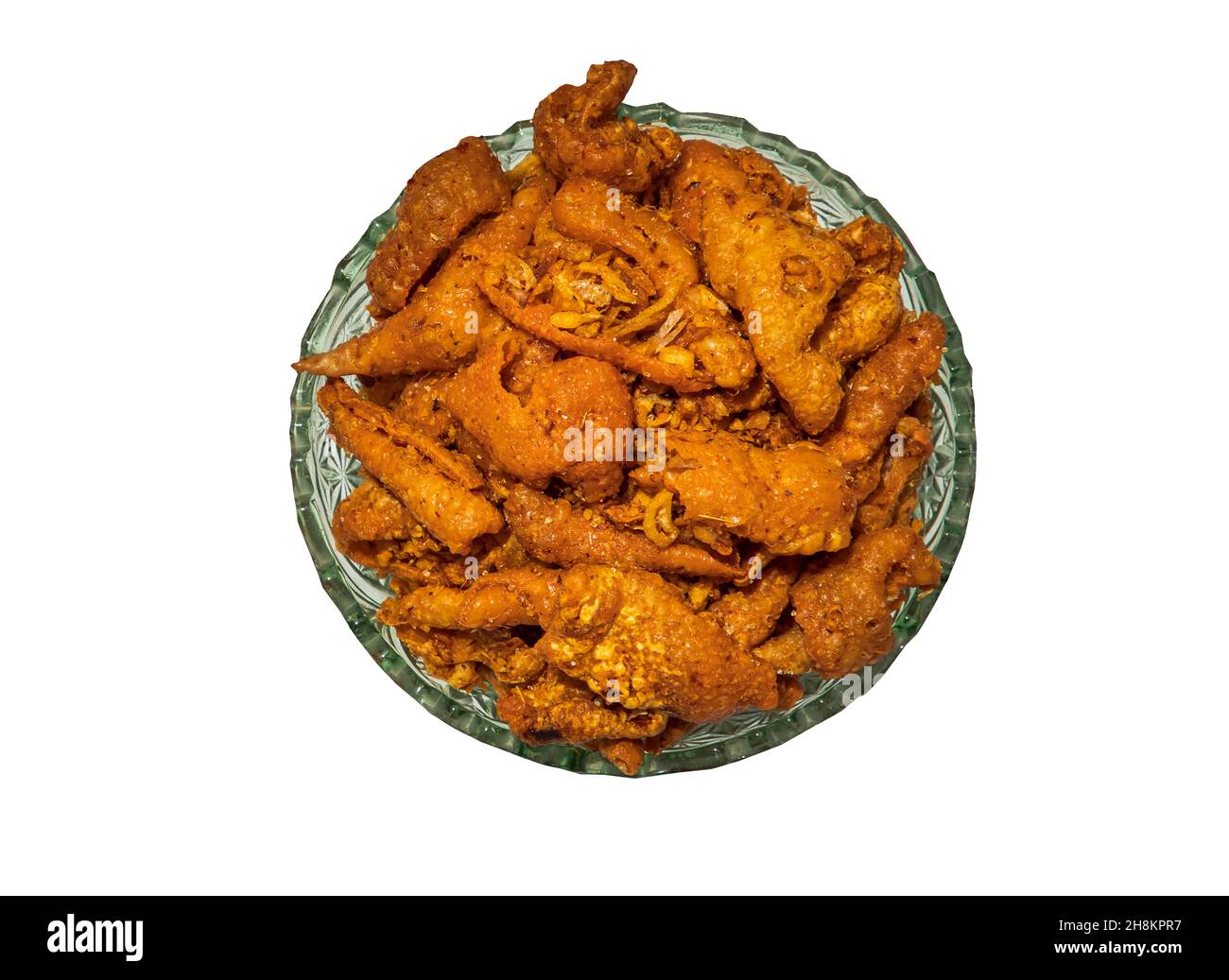 Crispy chicken skin chili paste in glass bowl isolated on white