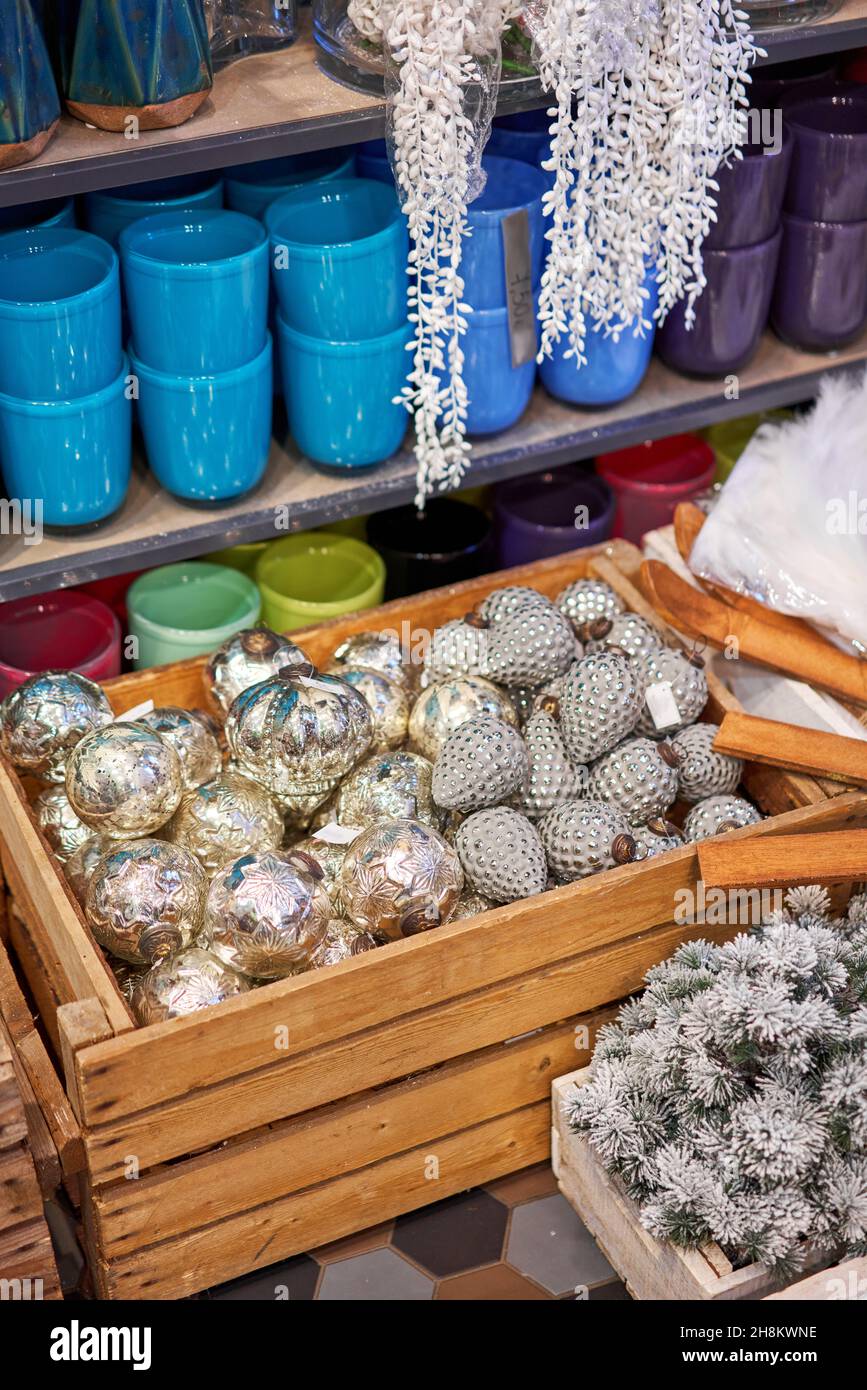 Market of decor . Lots of christmas decoration in store. Christmas shopping for new year tree Stock Photo