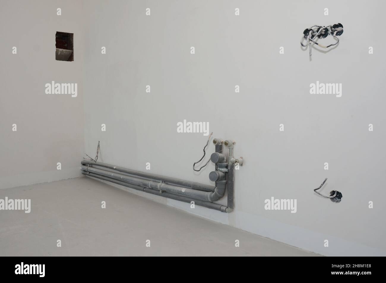 Kitchen renovation with finished walls, ventilation hole, plumbing