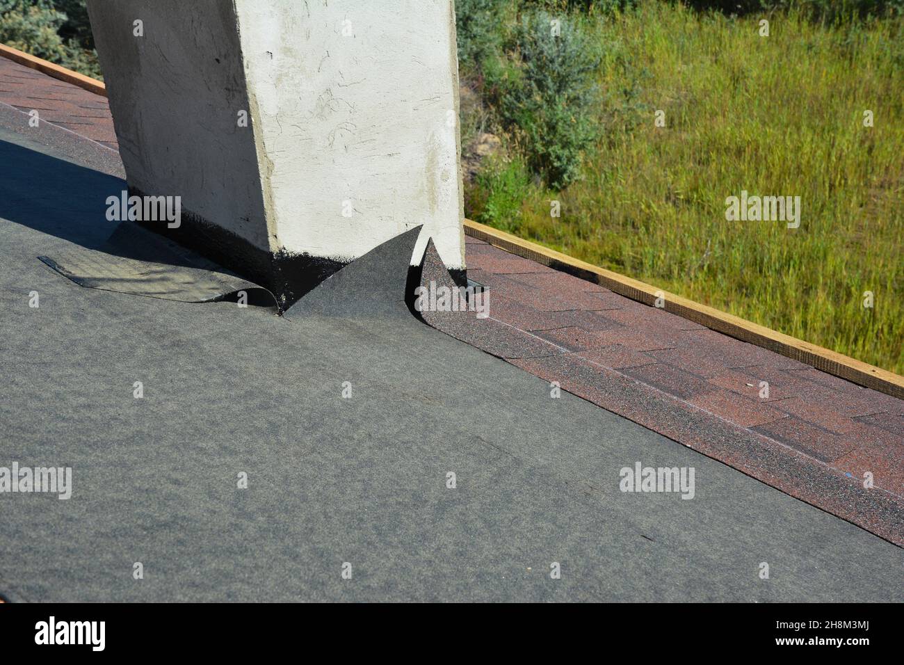 Asphalt roofing shingles installation and waterproofing chimney problem