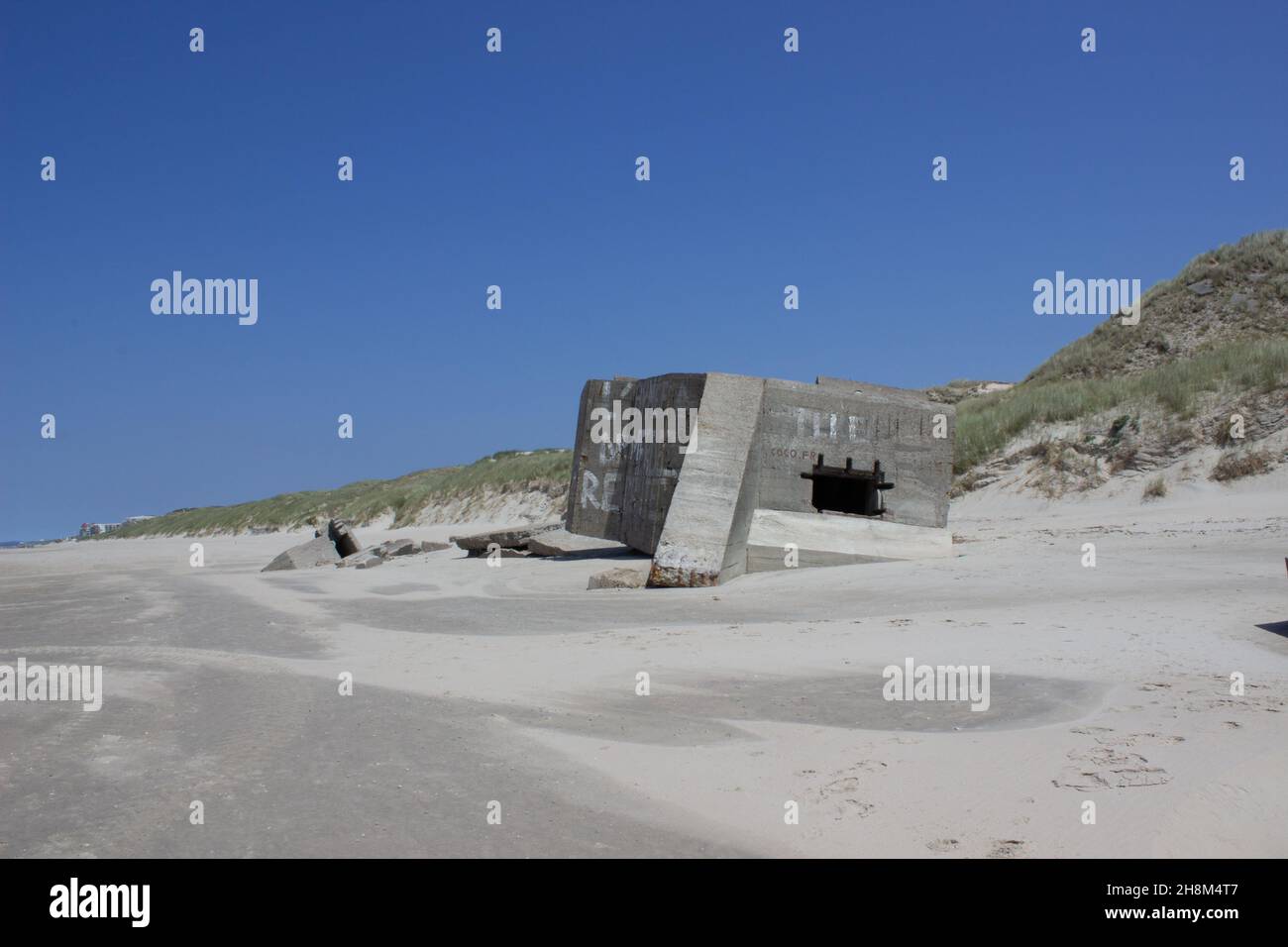 old german strongpoint / blockhaus of the second world war at the beach of Le Touquet, Pas de Calais, France Stock Photo