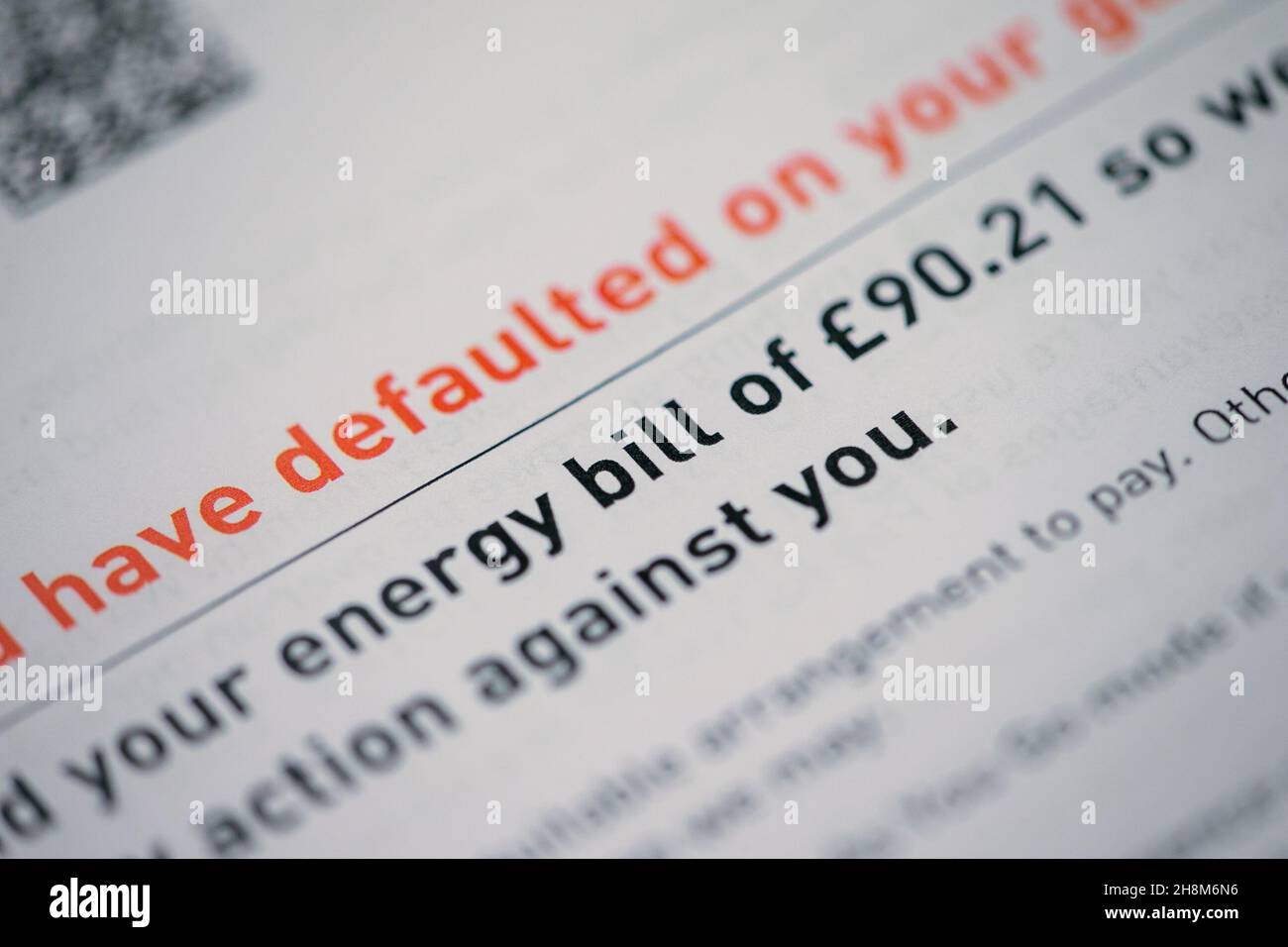 An energy bill claiming that the customer has defaulted on paying. Picture date: Wednesday December 1, 2021. Stock Photo