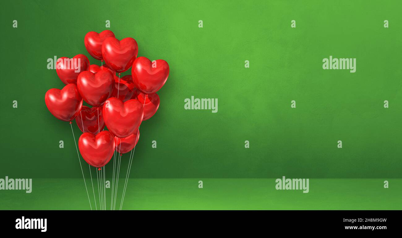 Red heart shape balloons bunch on a bgreen wall background. Horizontal ...