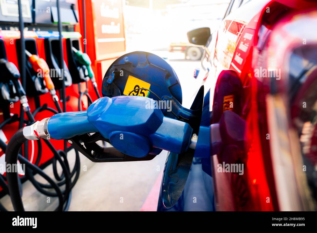 Car fueling at gas station. Refuel fill up with petrol gasoline. Petrol
