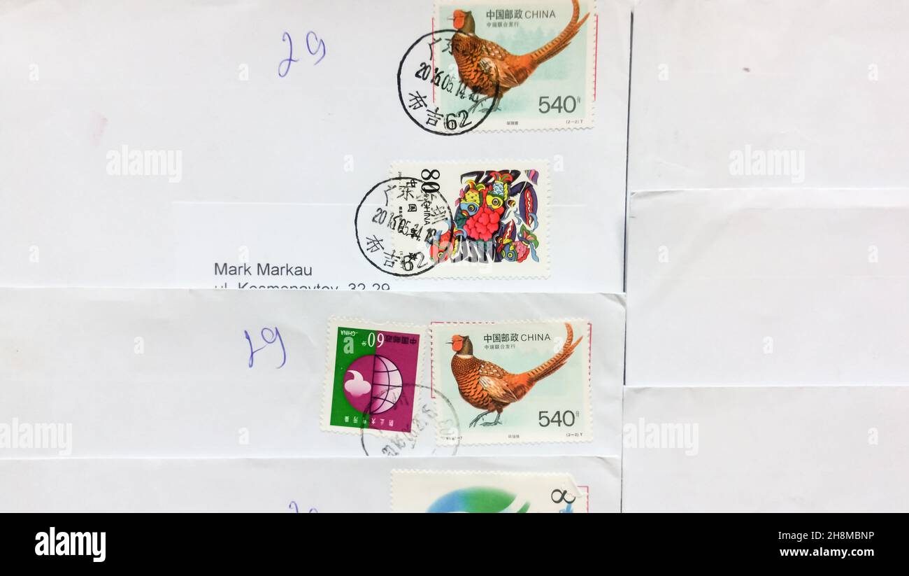 Lot of Old envelopes which was dispatched from China to  Belarus,  2020s. Stock Photo