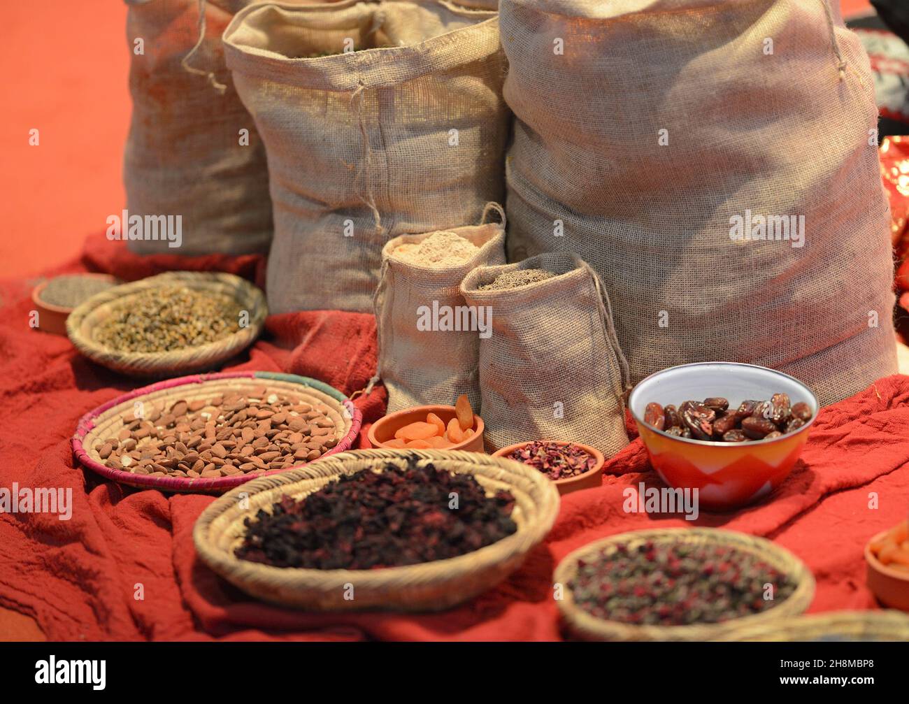 World Travel Market (WTM) at ExCel London, November 2021. Display at the Quatar stand - spices, nuts, fruit and dates Stock Photo