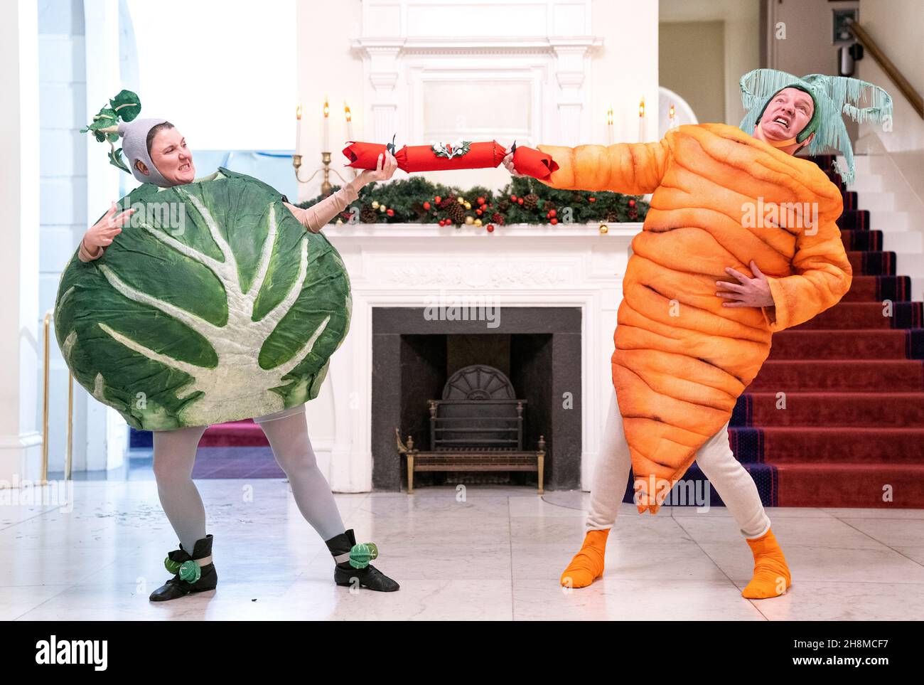 Cast members (from left) Sita Pieraccini and Richard Conlon get into character ahead of their show 'Christmas Dinner' at the Lyceum Theatre, Edinburgh, which will run from 6 December 2021 - 2 January 2022. Picture date: Tuesday November 30, 2021. Stock Photo