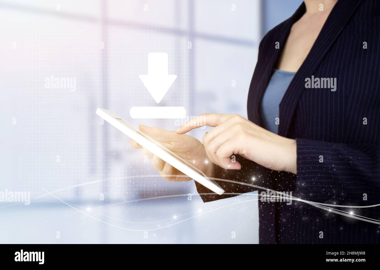 Download Data Storage Business Technology Network Concept. Hand touch white tablet with digital hologram download, data sign on light blurred backgrou Stock Photo