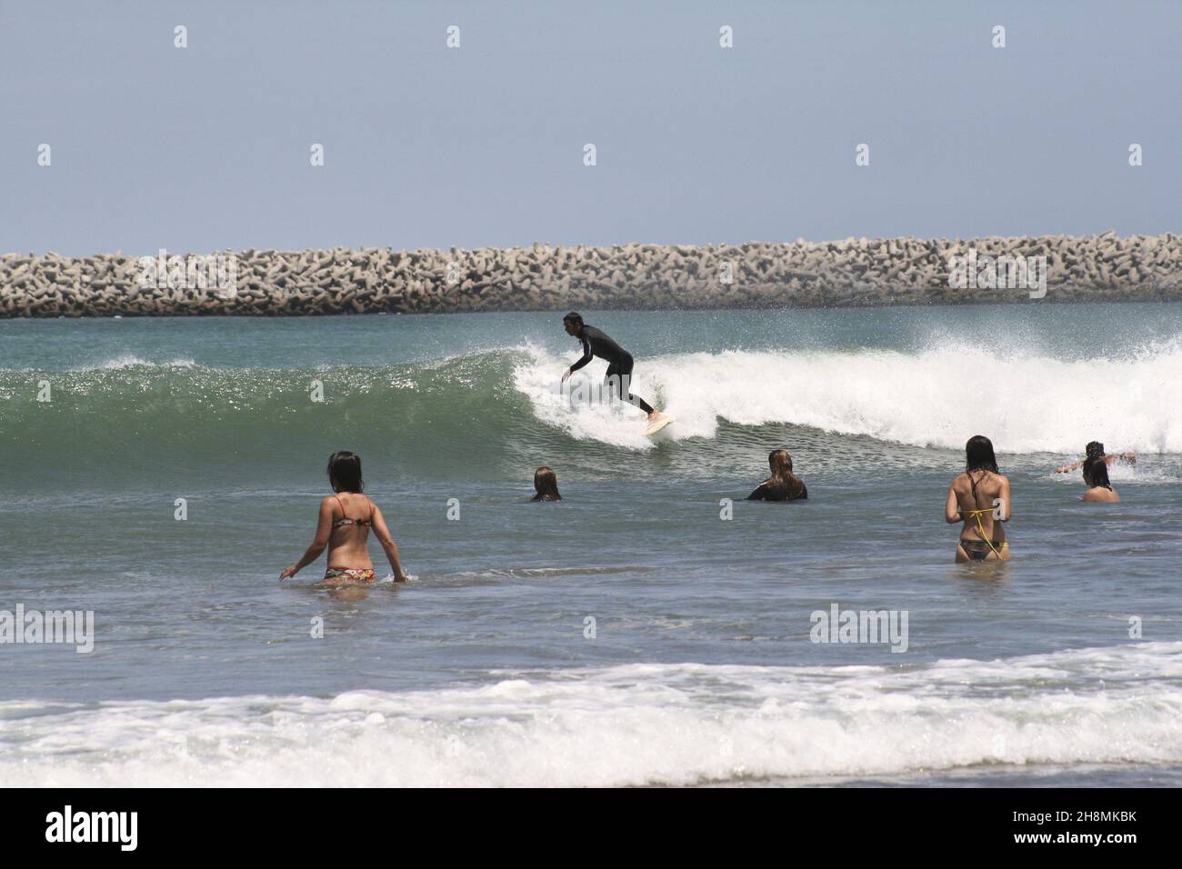 NECOCHEA, ARGENTINA - Sep 08, 2005: The people surfing in Necochea, buenos Aires, Argentina Stock Photo
