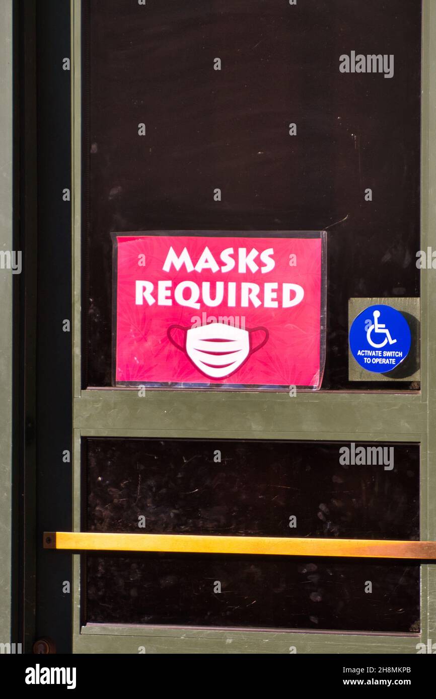 Scenic shot of a "Mask Required" sign in the Kansas City Zoo, Missouri