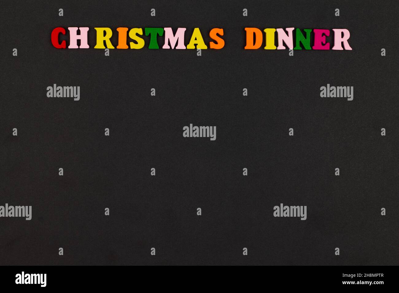 Christmas Dinner menu template on black background. Copy space for text. Christmas menu background concept. Design card for a restaurant menu for a Ch Stock Photo