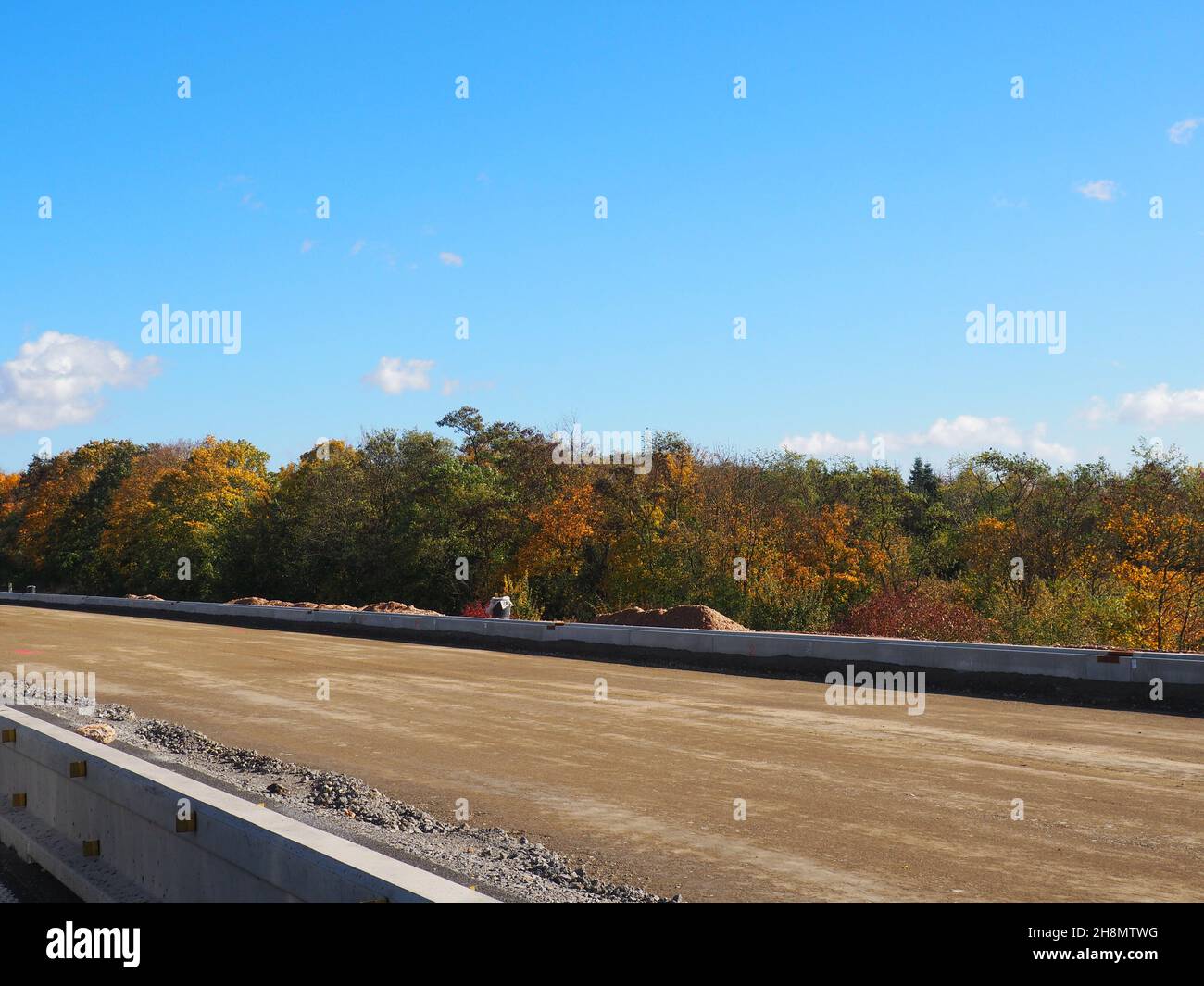 Daylight shot of highway construction site, substructure layer after