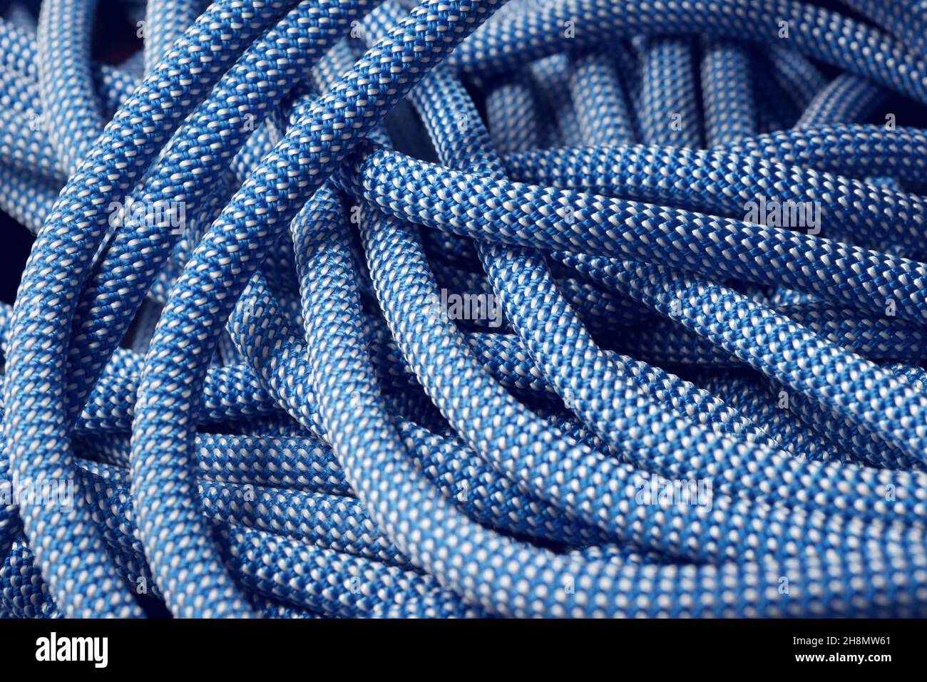 Blue climbing rope close up Stock Photo - Alamy