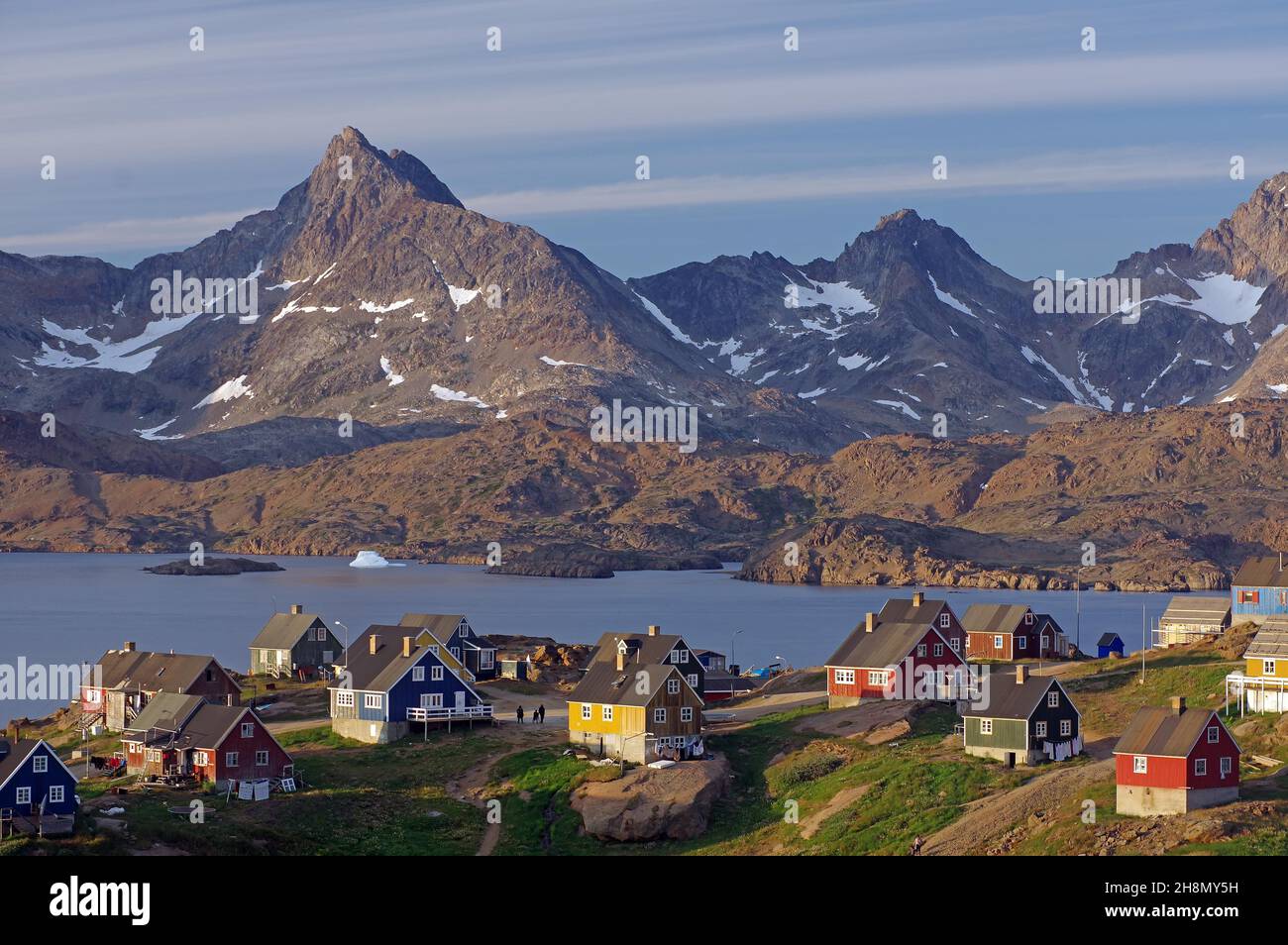 Wooden houses and mountains in the evening light, Tasilaq, Arctic, East