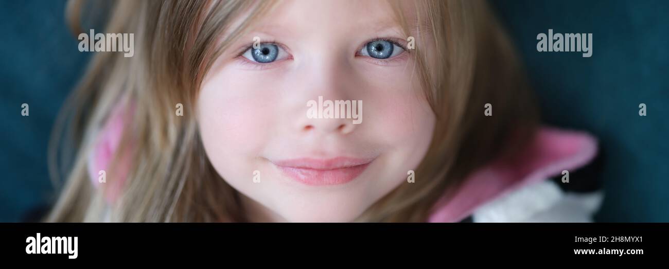 Portrait of beautiful cute little girl with blue eye Stock Photo - Alamy