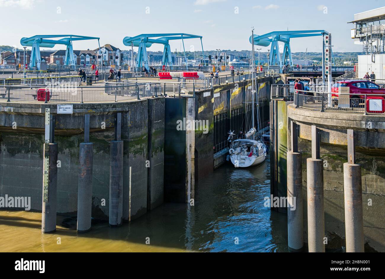 The three bascule bridges on the Cardiff Bay barrage on the south Wales coast in Ocrober Stock Photo