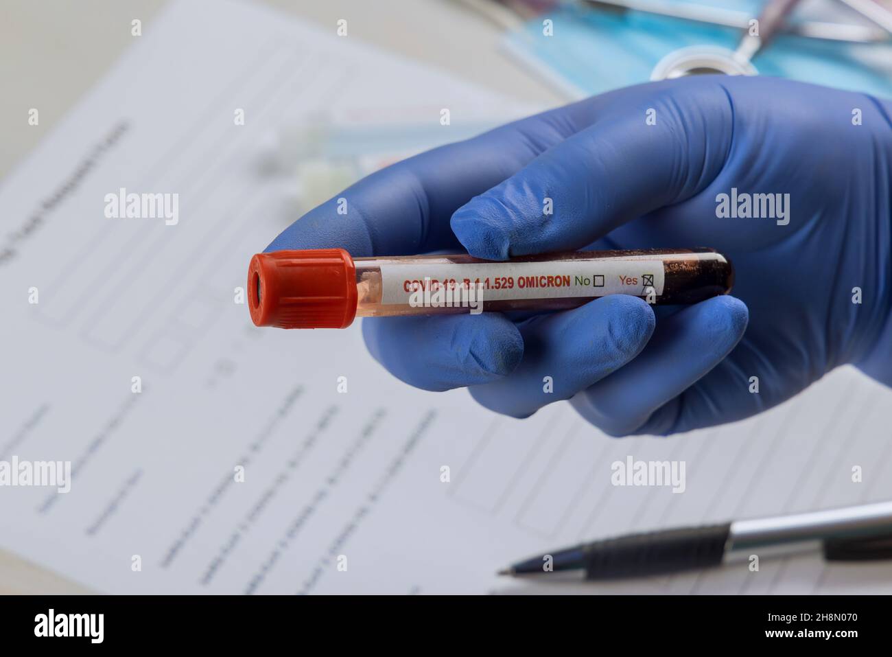 Medical professionals in the laboratory with blood samples for new version Omicron Covid-19 Coronavirus Stock Photo