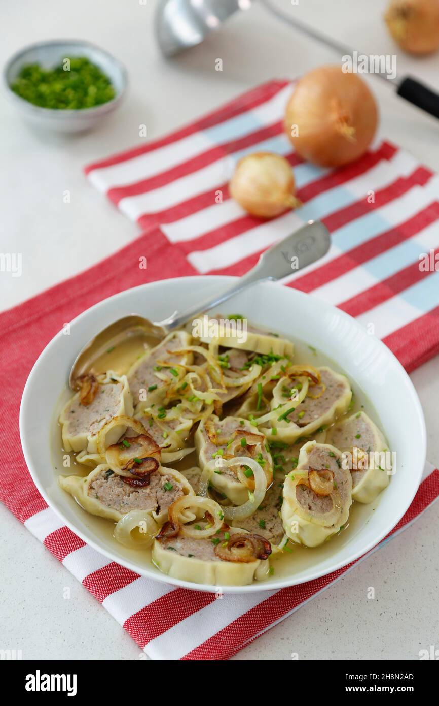 Swabian Cuisine Maultaschen In Broth With Stewed Onions Soup Plate swabian-cuisine-maultaschen-in-broth-with-stewed-onions-soup-plate