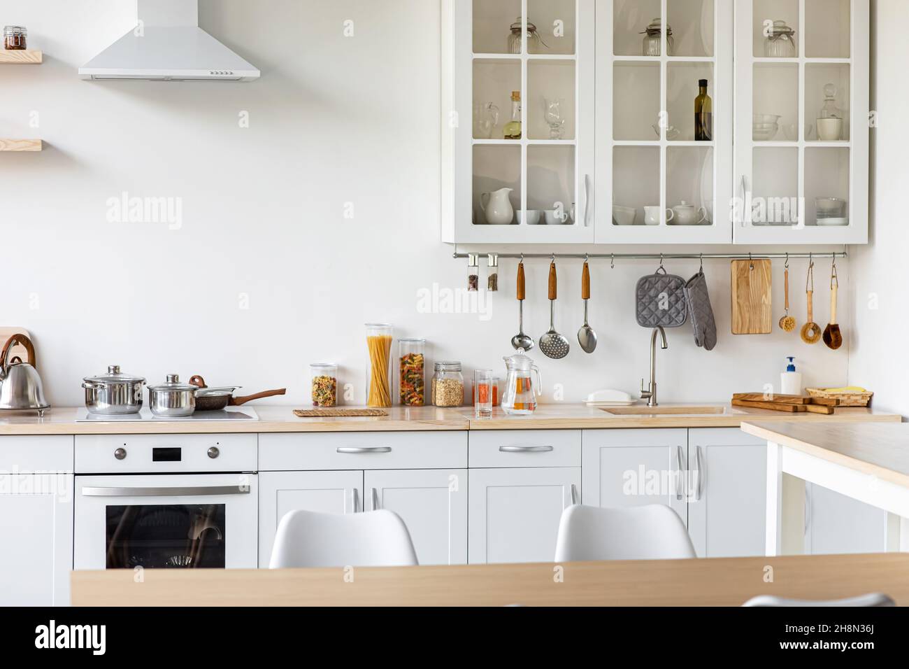 Minimalist scandinavian kitchen interior after renovation in new house Stock Photo
