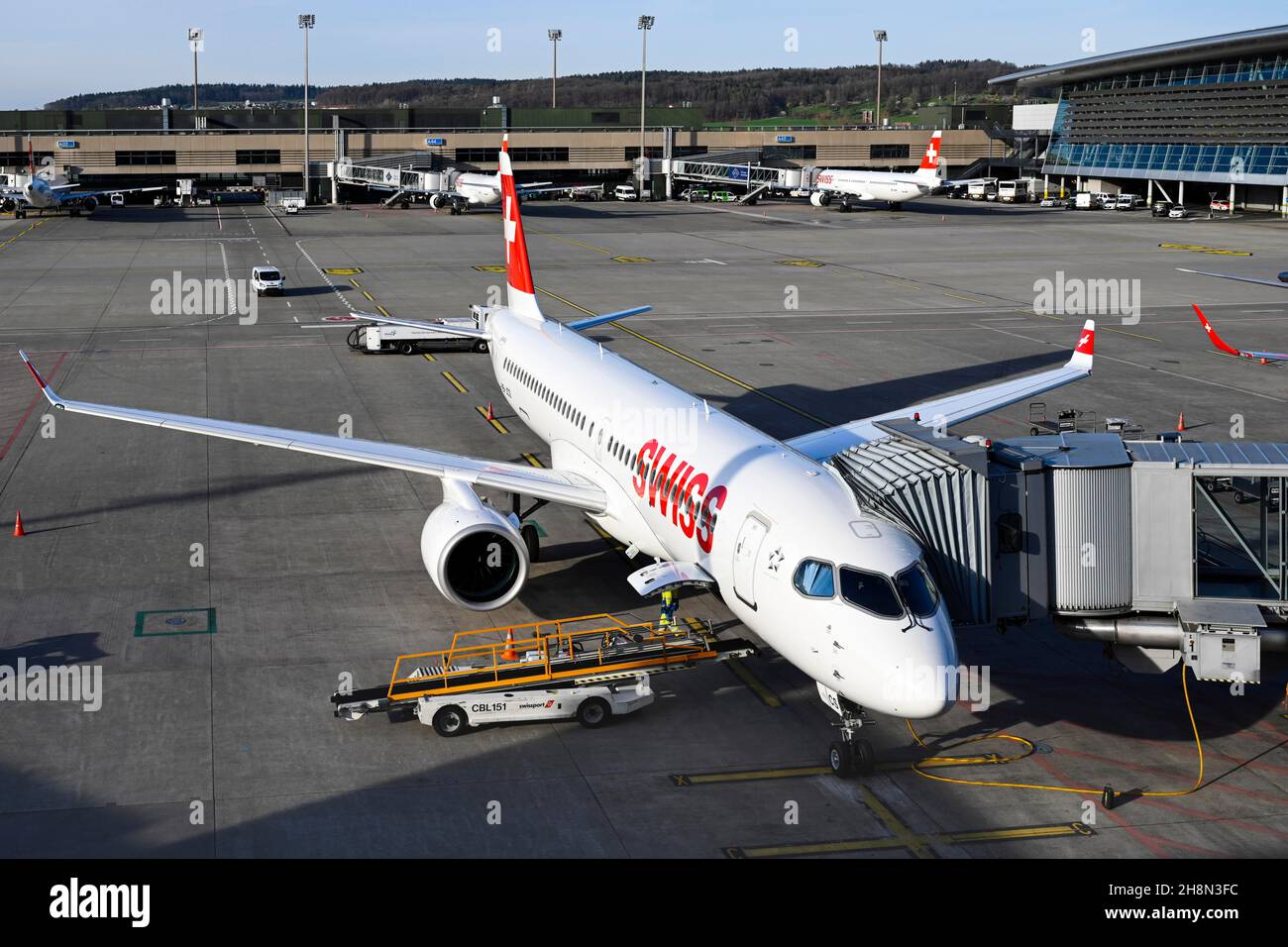 Zurich Airport with aircraft Swiss Airbus A220300 HBJCS, Zurich Kloten, Switzerland Stock