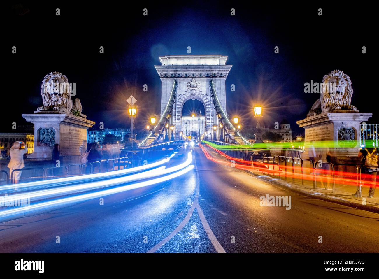 August 13th 2019 - Budapest, Hungary: Lion Statues in front of Chain Bridge (Hungarian: Széchenyi ) at night Stock Photo