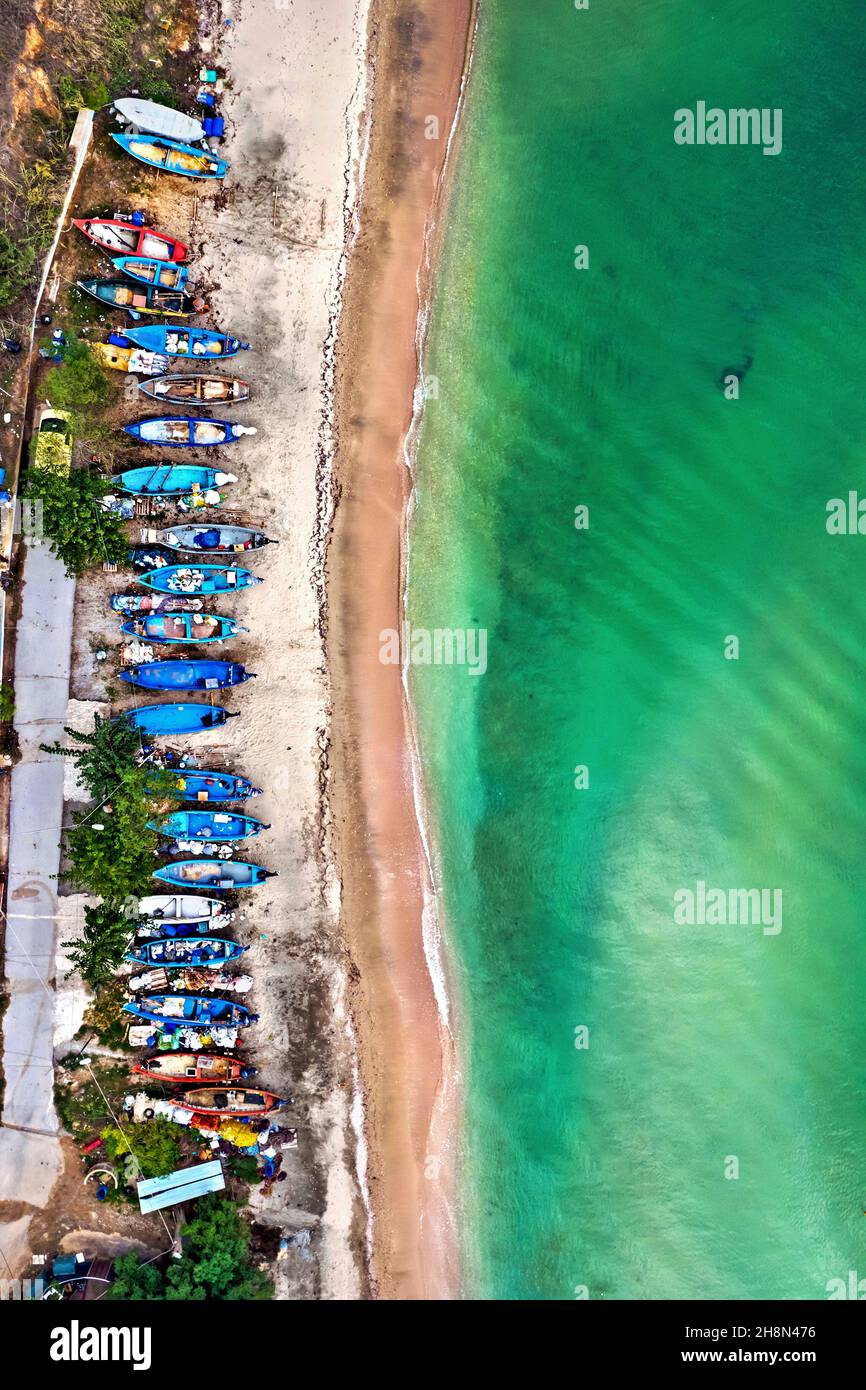 Fishing boats at the beach of Makrygialos town, Pieria, Central Macedonia, Greece. The majority of the inhabitants of the town are mussel cultivators. Stock Photo