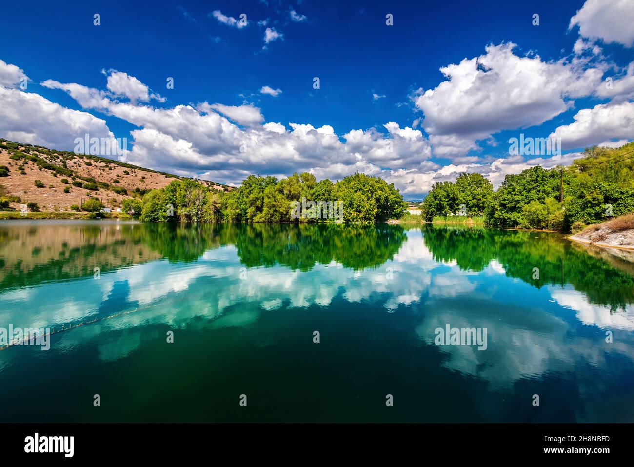Artificial lake in Kefalovryso village, municipality of Elassona, Larissa, Thessaly, Greece. Stock Photo