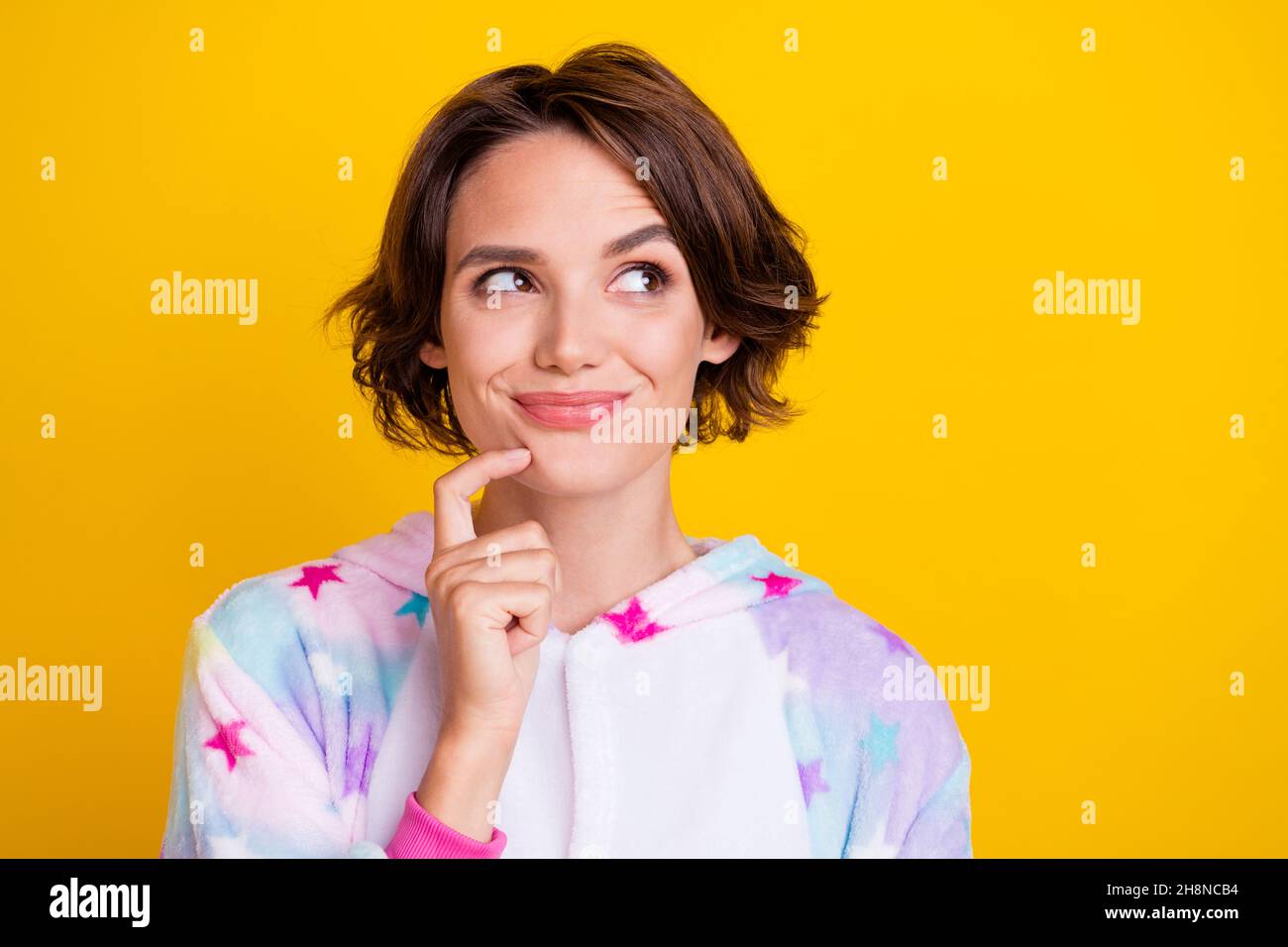 Photo of young girl happy positive smile finger touch chin thik idea ...
