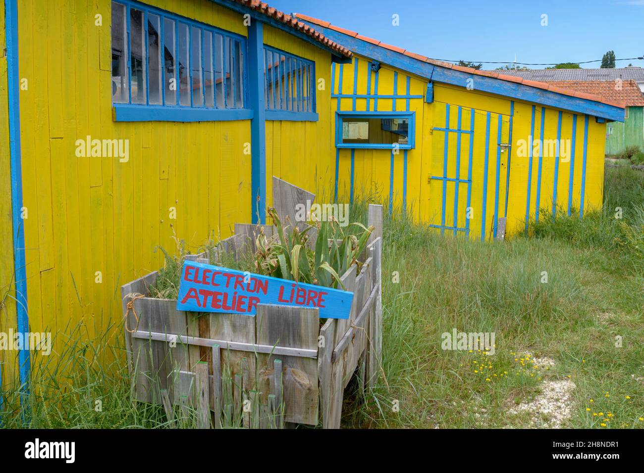 Oleron Island, Charente-Maritime, France - June 7, 2018 : Yellow oyster farming hut now arts and crafts workshop Chateau Oléron Atlantic coast France Stock Photo